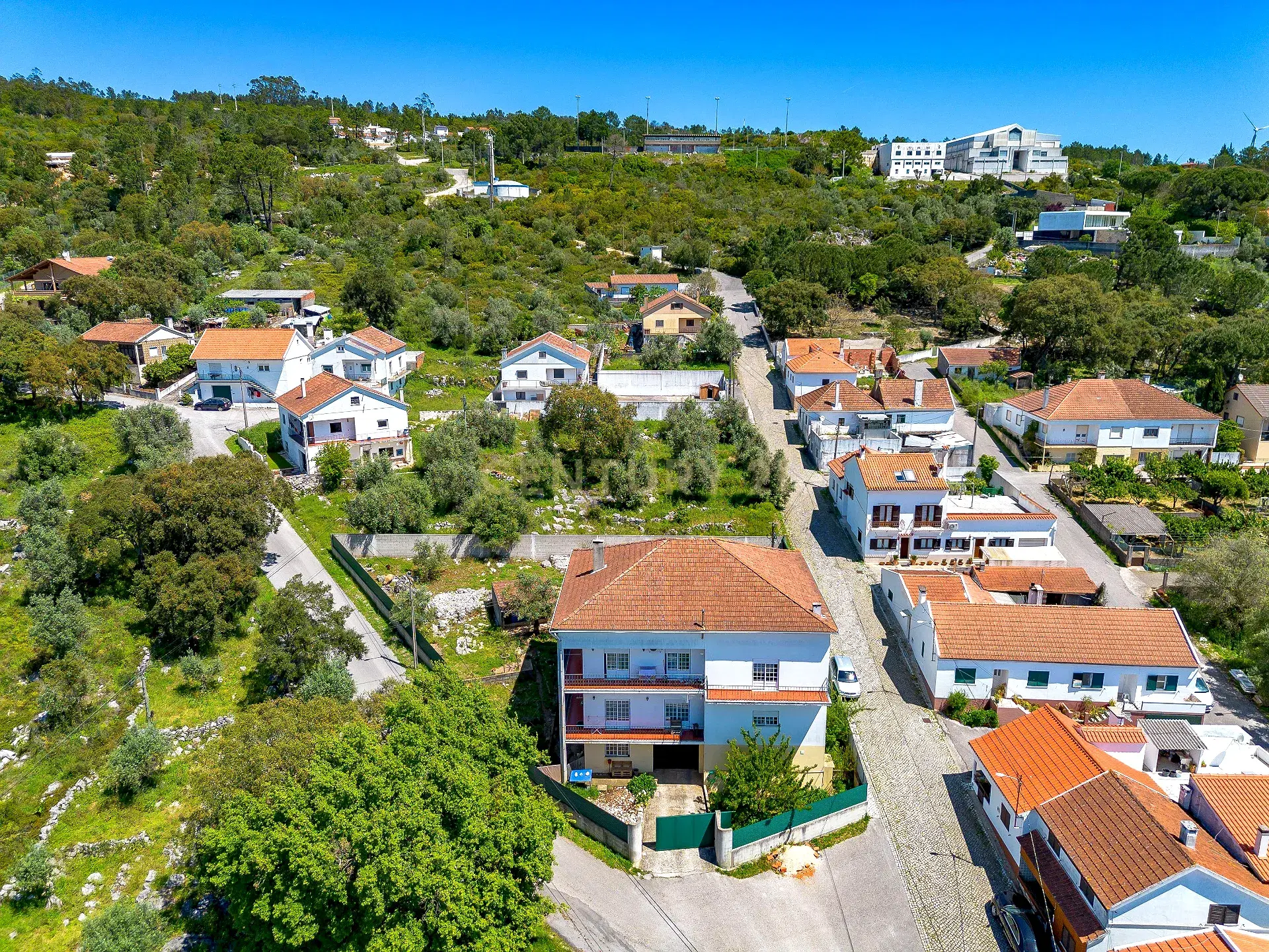 Multi-Family Property with Two 3-Bedroom Apartments, Garage and Development Potential